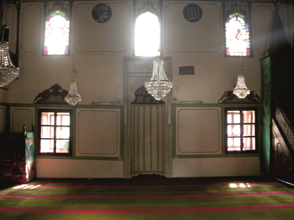 A richly decorated 18th-century Ottoman timber-roofed mosque dated 1788, noted for its painted ornamentation.