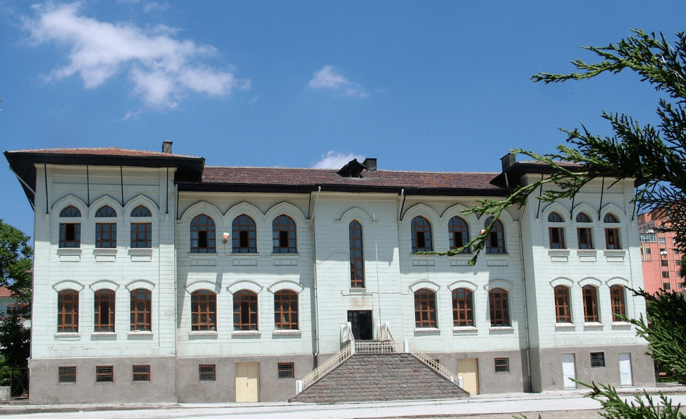 An early-Republican-era school building opened in 1930, now serving as the rectorate of Bozok University.